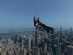 Daredevil urban climbers Angela Nikolau (33) and Ivan Kuznetsov, known as Ivan Beerkus (32), made international headlines after scaling the forbidden 1,454-foot antenna of New York's Empire State Building(Photo: Instagram)