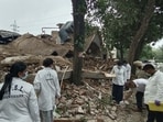 Forensic experts at the mishap site in UT Phase 2 Industrial Area. (Keshav Singh/HT)