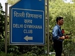 Members of media work outside the Delhi Gymkhana Club, one of the oldest clubs in India.