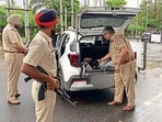 Police checking a car in Ludhiana on Sunday. (HT Photo)