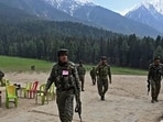 Security personnel inspecting the terror attack site in the Baisaran meadow near Pahalgam a day after terrorists targeted civilians on April 22, 2025, leaving 26 people dead. (AFP file photo)