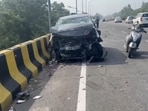 The mangled remains of the car in which the family was travelling when it was hit by an SUV near Bidhipur village on the Jalandhar-Amritsar national highway on Sunday evening. (HT Photo)