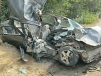 The mangled remains of the victims’ car after it rammed head on with a truck near Mansa’s Bhikhi town on Saturday night. (HT)