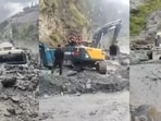 Video grabs of vehicles stuck in debris on the Doda-Kishtwar highway near the under-construction Kwar Hydroelectric Project on Monday.