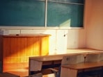 The boy was rescued more than four hours after the school had closed when a passerby heard his cries for help.