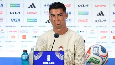 Cristiano Ronaldo #7 of Portugal speaks to the media during the press conference in Dallas (Getty Images via AFP) Cristiano Ronaldo #7 of Portugal speaks to the media during the press conference in Dallas (Getty Images via AFP)