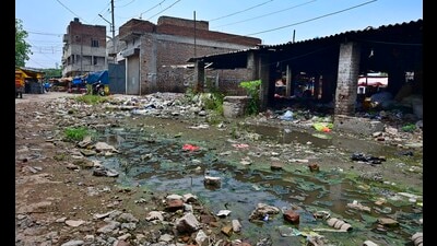 Sewage water, heap of garbage lying on the road in Nanak Nagar in Ludhiana on Monday. (Gurpreet Singh/HT) Sewage water, heap of garbage lying on the road in Nanak Nagar in Ludhiana on Monday. (Gurpreet Singh/HT)