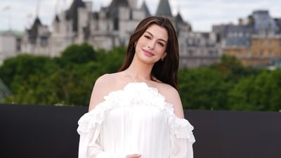 Anne Hathaway is mother! The actor, who announced her pregnancy a few days ago, flaunted her baby bump as she posed at the photo call for The Odyssey in London. (Photo by Scott A Garfitt/Invision/AP) (AP Photo/Scott A Garfitt) Anne Hathaway is mother! The actor, who announced her pregnancy a few days ago, flaunted her baby bump as she posed at the photo call for The Odyssey in London. (Photo by Scott A Garfitt/Invision/AP) (AP Photo/Scott A Garfitt)