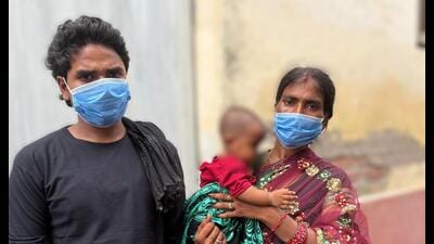 The parents of the five-month-old infant reunited with their daughter after her rescue. (Sourced)