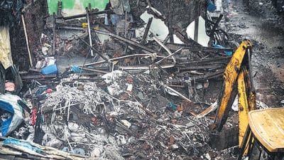 Throughout Monday, civic workers continued clearing the debris at the site amid heavy police deployment and barricades (Raju Shinde) Throughout Monday, civic workers continued clearing the debris at the site amid heavy police deployment and barricades (Raju Shinde)