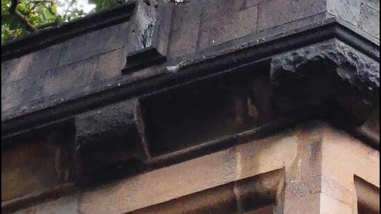 Stone piece falls off MU entrance gate