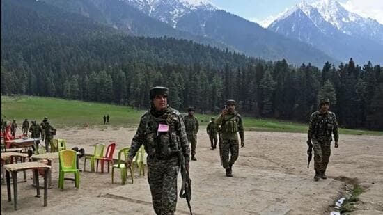 Security personnel inspecting the terror attack site in the Baisaran meadow near Pahalgam a day after terrorists targeted civilians on April 22, 2025, leaving 26 people dead. (AFP file photo)