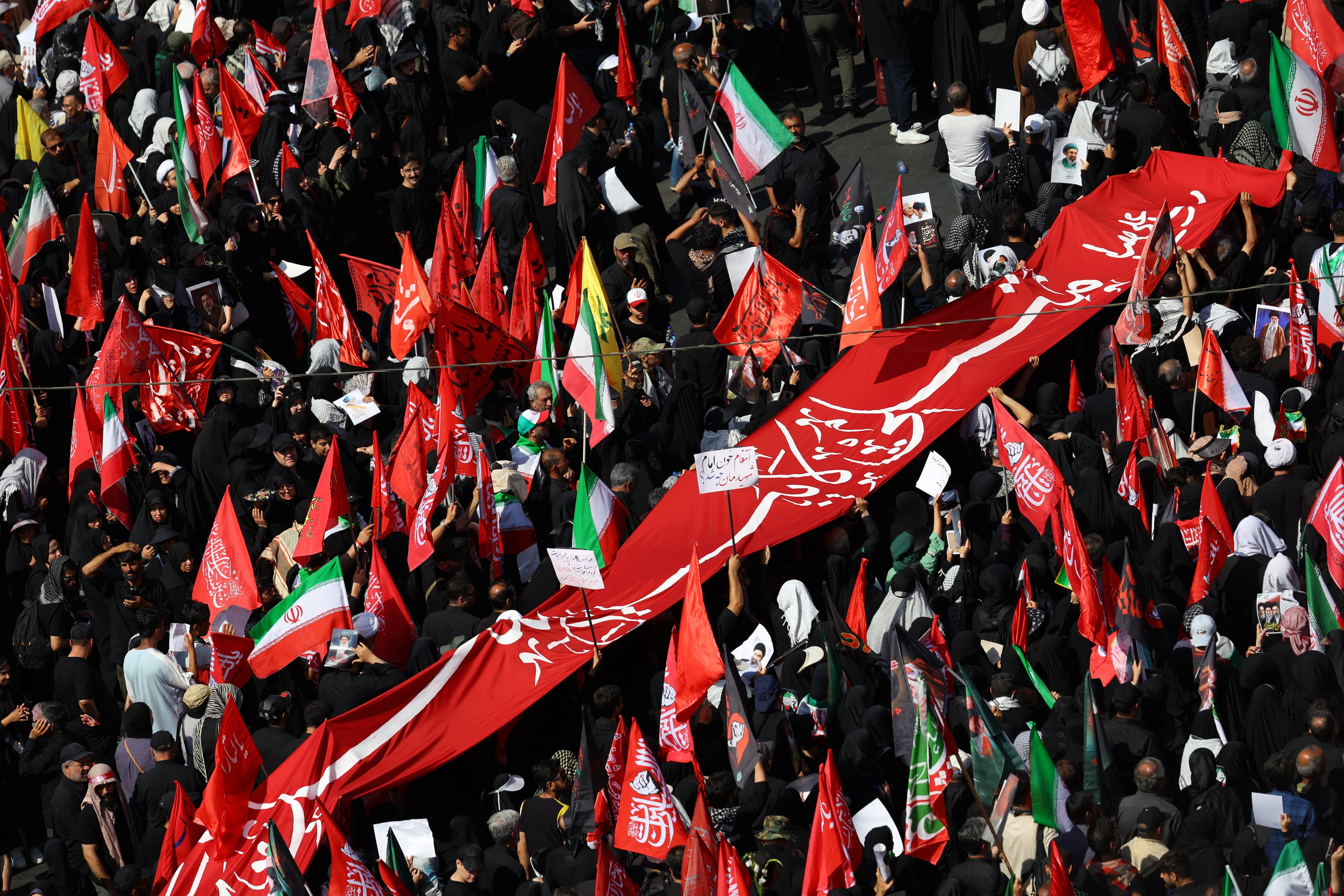 Mourners gather on the day of a funeral procession for Iran's late Supreme Leader Ayatollah Ali Khamenei, who was killed on February 28 in Israeli and US airstrikes, in Tehran, Iran. (REUTERS)