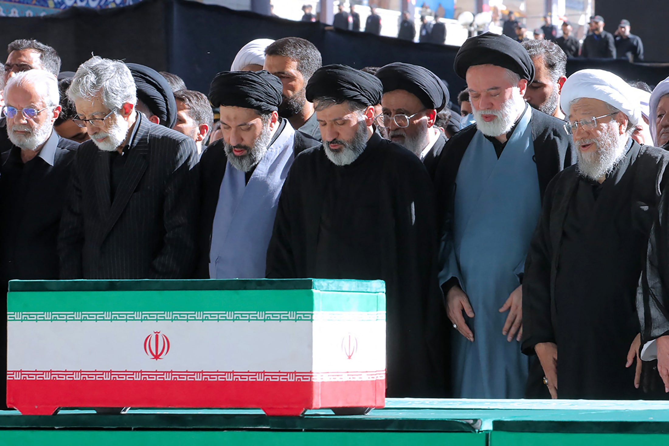 The three of the sons of slain Iranian supreme leader Ayatollah Ali Khamenei - Meysam (3rd L), Masoud (C) and Mostafa (2nd R) - praying alongside Iranian officials at the Grand Mosalla on Sunday. (AFP) The three of the sons of slain Iranian supreme leader Ayatollah Ali Khamenei - Meysam (3rd L), Masoud (C) and Mostafa (2nd R) - praying alongside Iranian officials at the Grand Mosalla on Sunday. (AFP)