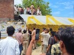 Buffer zone officials rescuing a female leopard on Monday. (Sourced)