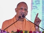 Chief minister Yogi Adityanath speaks during foundation stone laying ceremony of various development projects, in Pratapgarh district, on Tuesday. (PTI Photo)