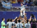 Lionel Messi inspired a dramatic late comeback as Argentina recovered from two goals down to beat Egypt 3-2, keeping their World Cup title defence alive and booking a place in the quarterfinals.(AFP)