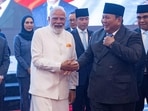 India's Prime Minister Narendra Modi (C) shakes hands with Indonesia's President Prabowo Subianto during his visit at the parliament building in Jakarta on July 7, 2026.