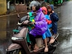 Thiruvananthapuram: Commuters cover themselves amid rainfall, in Thiruvananthapuram, Kerala, Saturday, July 4, 2026. Thiruvananthapuram: Commuters cover themselves amid rainfall, in Thiruvananthapuram, Kerala, Saturday, July 4, 2026.