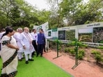 Union Home Minister Amit Shah along with Delhi Chief Minister Rekha Gupta during a tree plantation drive carried out in the President's Bodyguard premises, in New Delhi.