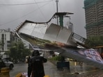 Thane, India - July -06, 2026: Thane district has been placed under a heavy rainfall alert. On Monday morning, due to strong winds, a hoarding erected on the road divider at Pokhran Road No. 2 in Thane collapsed., no one was injured in the incident ,in Thane ,in Mumbai, India, on, Monday, July -06, 2026. ( photo by Praful Gangurde / Hindustan Times ) (praful Gangurde)