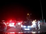 The Maddur police arrested the suspects after footage of the man being dragged out of his vehicle and then kicked and punched by a group of men – in front of his wife and son – went viral on social media. (X/@HateDetectors)