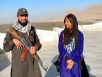 Sharanya Iyer with a Taliban soldier in Kandahar, Afghanistan. 