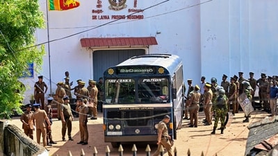 Security personnel escort prisoners to a bus at Negombo prison on the outskirts of Colombo on July 6, 2026, following overnight clashes between inmates of two drug gangs. (AFP) Security personnel escort prisoners to a bus at Negombo prison on the outskirts of Colombo on July 6, 2026, following overnight clashes between inmates of two drug gangs. (AFP)