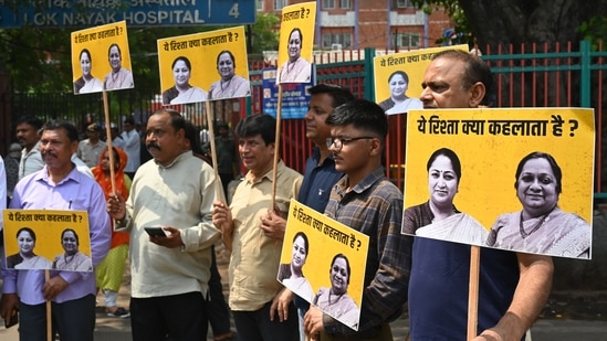 AAP Party leaders along with its supporters, staged a peaceful protest in front of LNJP Hospital and raise alleged a ₹650 crore corruption in procurement medicines and medical equipment by the health department, in New Delhi, India, on Monday. (Hindustan Times)