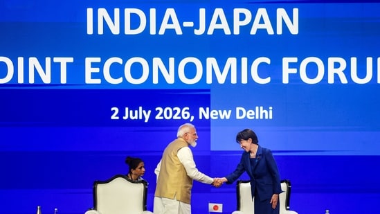 Prime Minister Narendra Modi greets Japanese Prime Minister Sanae Takaichi during the India-Japan Joint Economic Forum, in New Delhi. (DPR PMO)