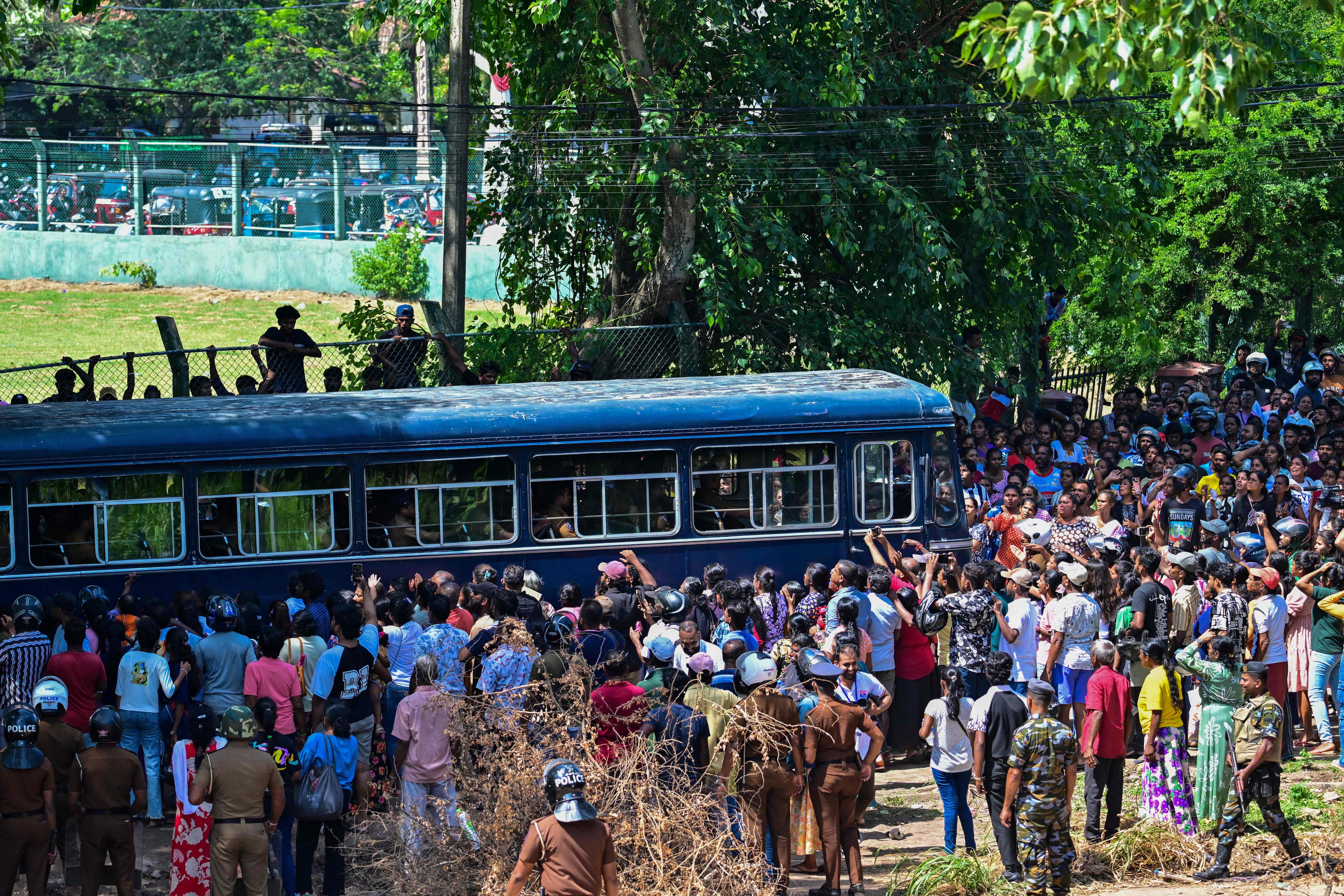 A bus carrying prisoners to be transferred to another jail makes its way following overnight clashes between inmates of two drug gangs at Negombo prison near Colombo on July 6, 2026. (AFP) A bus carrying prisoners to be transferred to another jail makes its way following overnight clashes between inmates of two drug gangs at Negombo prison near Colombo on July 6, 2026. (AFP)