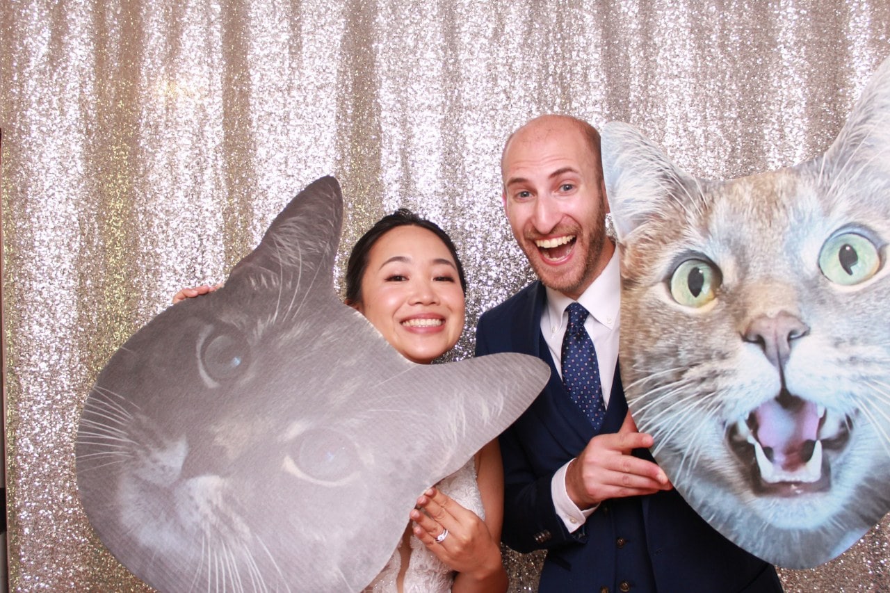 Steven and Amanda with Jaboo cutouts in their wedding photo booth.
