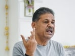 TMC MP Kirti Azad addresses a press conference at his residence, in New Delhi on Wednesday. 