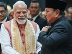 Prime Minister Narendra Modi shakes hands with Indonesian President Prabowo Subianto during an Indian community event, in Jakarta on Tuesday.