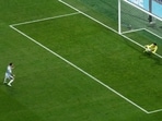 Egypt goalkeeper Mostafa Shoubir (23) saves a penalty kick by Argentina's Lionel Messi (10) during the World Cup round of 16 soccer match between Argentina and Egypt in Atlanta.