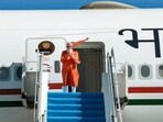 Prime Minister Narendra Modi greets as he emplanes for Melbourne, in Indonesia. (@pmoindia)