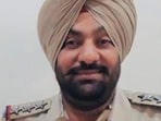 Punjab Police inspector Gurinderjit Singh Nagra is accused of being hand-in-glove with members of the Jaggu Bhagwanpuria gang to target civilians with false accusations and demands for money. The station house officer of Tanda has been sent to the Police Lines in Hoshiarpur pending inquiry. (HT file photo)
