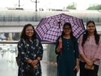 Gram it: Come rain or shine, smile! These Delhiites were spotted enjoying the recent showers at Tilak Marg, as rain arrived in the city after days of hot and humid weather. The IMD has issued a forecast of cloudy sky and very light rain for today as well.  