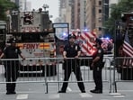 NYPD officers stand guard near the former Pfizer headquarters building on July 07, 2026 in New York City. 