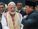 Prime Minister Narendra Modi shakes hands with Indonesian President Prabowo Subianto during an Indian community event, in Jakarta on Tuesday.
