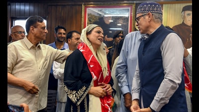 Ex-District Development Council (DDC) chairperson Baramulla Safina Baig interacts with Jammu and Kashmir CM Omar Abdullah at the National Conference headquarters in Srinagar on Wednesday. (ANI) Ex-District Development Council (DDC) chairperson Baramulla Safina Baig interacts with Jammu and Kashmir CM Omar Abdullah at the National Conference headquarters in Srinagar on Wednesday. (ANI)