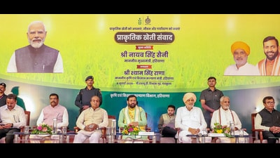 Haryana Chief Minister Nayab Singh Saini, along with other dignitaries, participates in the "Natural Farming Dialogue Program", in Panchkula on Wednesday. (ANI)