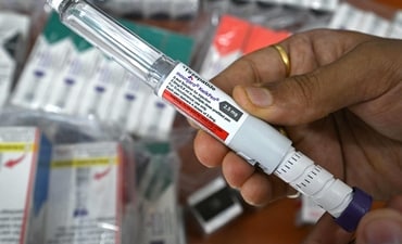 A medicine distributor displays Mounjaro (tirzepatide) self-injecting GLP-1 prefilled pens at his office in Thane on March 20, 2026. (AFP FILE) A medicine distributor displays Mounjaro (tirzepatide) self-injecting GLP-1 prefilled pens at his office in Thane on March 20, 2026. (AFP FILE)