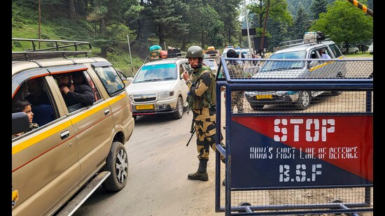 Security personnel keep vigil at a check post during the ongoing Amarnath Yatra in Pahalgam on Wednesday. (PTI)