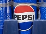 PepsiCo stock fell 5% after earnings as higher costs. (Photographer: Sergio Flores/Bloomberg)