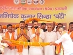 Bihar chief minister Samrat Choudhary with BJP candidate of Bankipur assembly constituency Abhishek Sinha Bunty, Deputy CM Vijay Choudhary and NDA leaders being garlanded during nomination meeting in Patna. (Santosh Kumar/ HT)