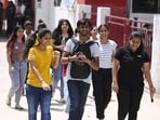 Candidates coming out of Bhonwal Institute of Engineering in Lucknow after writing the CUET-UG exam.