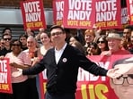Labour party candidate Andy Burnham addresses supporters outside the Labour party campaign office in Ashton in Makerfield, northwest England.