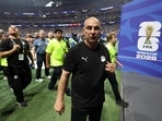 Egypt coach Hossam Hassan looks dejected after the match following their elimination from the World Cup