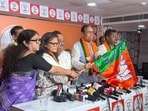 Samik Bhattacharya welcomed the former MPs by presenting them with BJP flags during a programme attended by senior state leaders at the party's Salt Lake office.